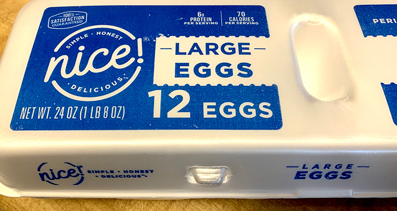 Photo of an egg carton with the brand name Nice Large Eggs.