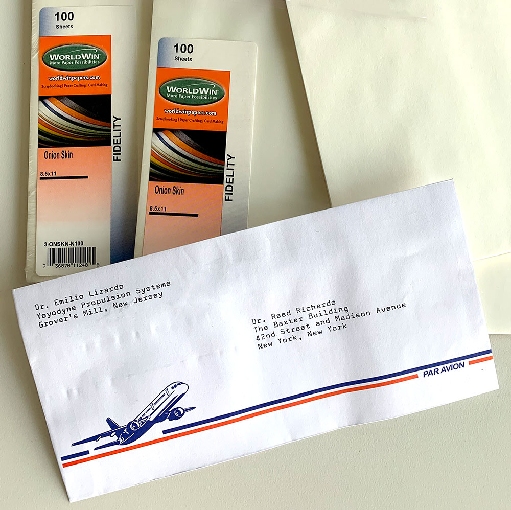 Photo of envelopes and paper with a retro design designed to emulate lightweight products use when airmail cost a lot.