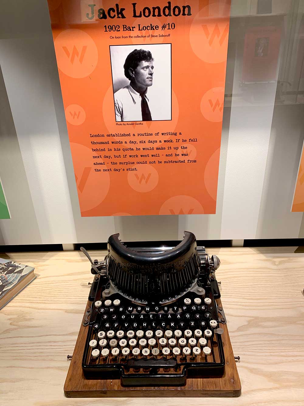 Museum display shows Jack London's 1902 Bar-Lock typewriter. This machine bears little resemblence to later typewriters and has separate keys for uppercase and lowercase letters, as well as keys for numbers seemingly scattered at random. It could pass for a spy coding and decoding device.