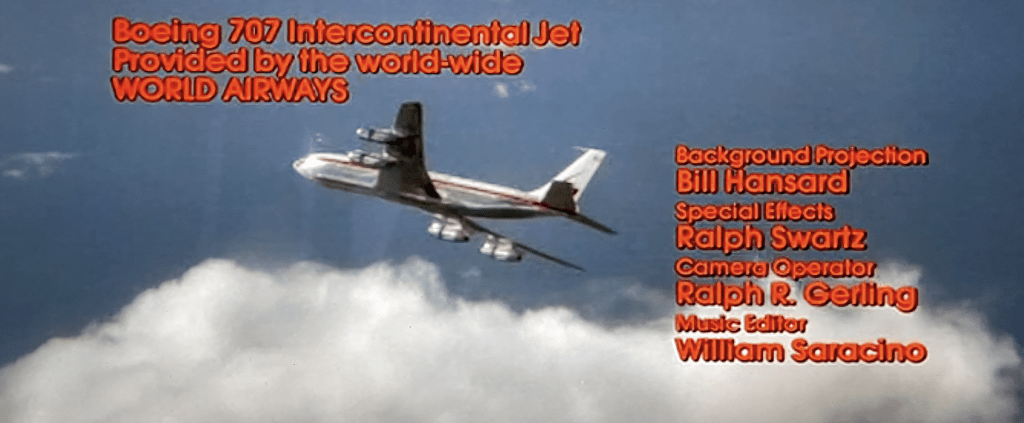 Screenshot from the main title of the 1972 movie Skyjacked shows a Boeing 707-373C airliner gracefully banking to the right above a cloud bank.
